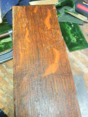 The original, damaged, finish